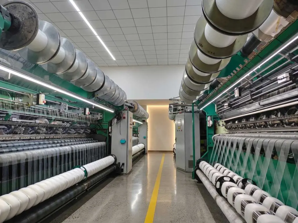 High-speed tricot knitting machine for nylon hairnet production at Alit factory in China